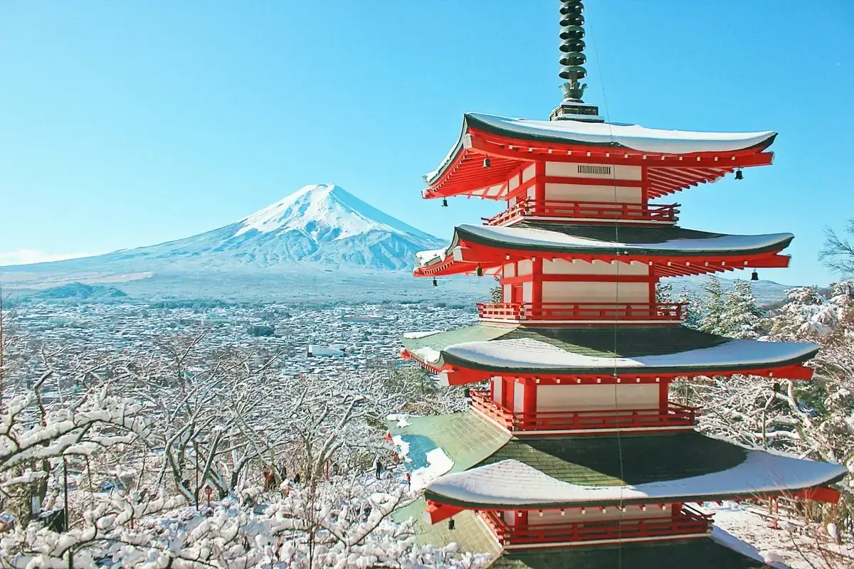 Snow-covered Chureito Pagoda with Mount Fuji in winter — iconic Japan travel destination