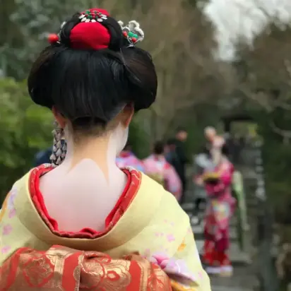 Geisha walking in a street in Tokyo