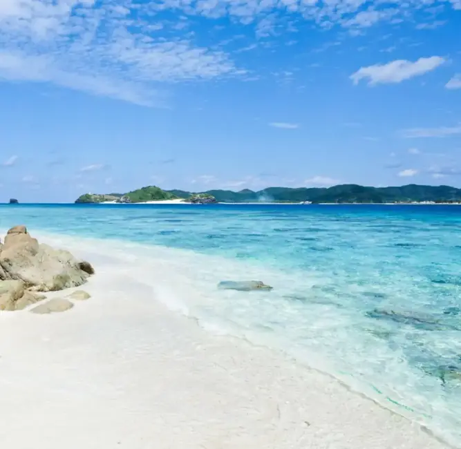 Pristine Okinawa beach with crystal clear turquoise waters and white sand