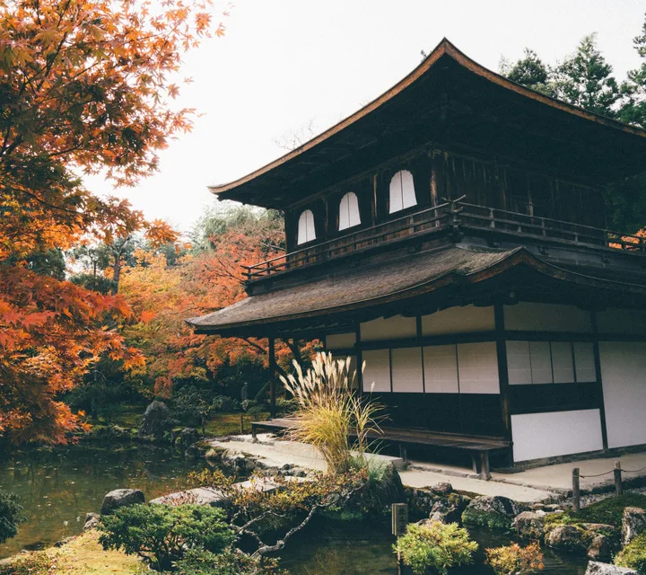 Ginkaku-ji, the Silver Pavilion in Kyoto, framed by red maples in autumn